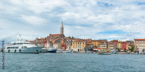 View of the port of Rovinj and old colorfull city on a sunny summer day.