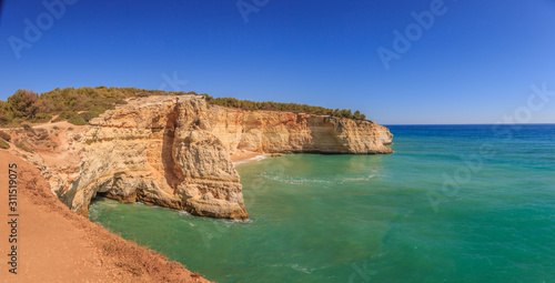 Panoramic view on cliffy Algarve coast in Portugal in summer