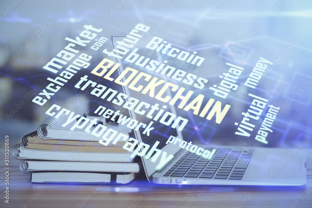 Double exposure of blockchain theme hologram and table with computer background. Concept of bitcoin crypto currency. Double exposure of blockchain theme hologram and table with computer background. Concept of bitcoin crypto currency.