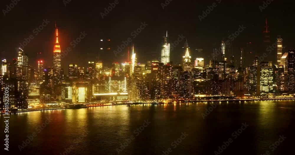 Epic timelapse of NYC East River Skyline. Empire State, chrysler building, United Nations, Sunrise to sunset, with clouds and boats. 4k+ shot on a Canon 1Dx Raw. Epic timelapse of NYC East River Skyline. Empire State, chrysler building, United Nations, Sunrise to sunset, with clouds and boats. 4k+ shot on a Canon 1Dx Raw.