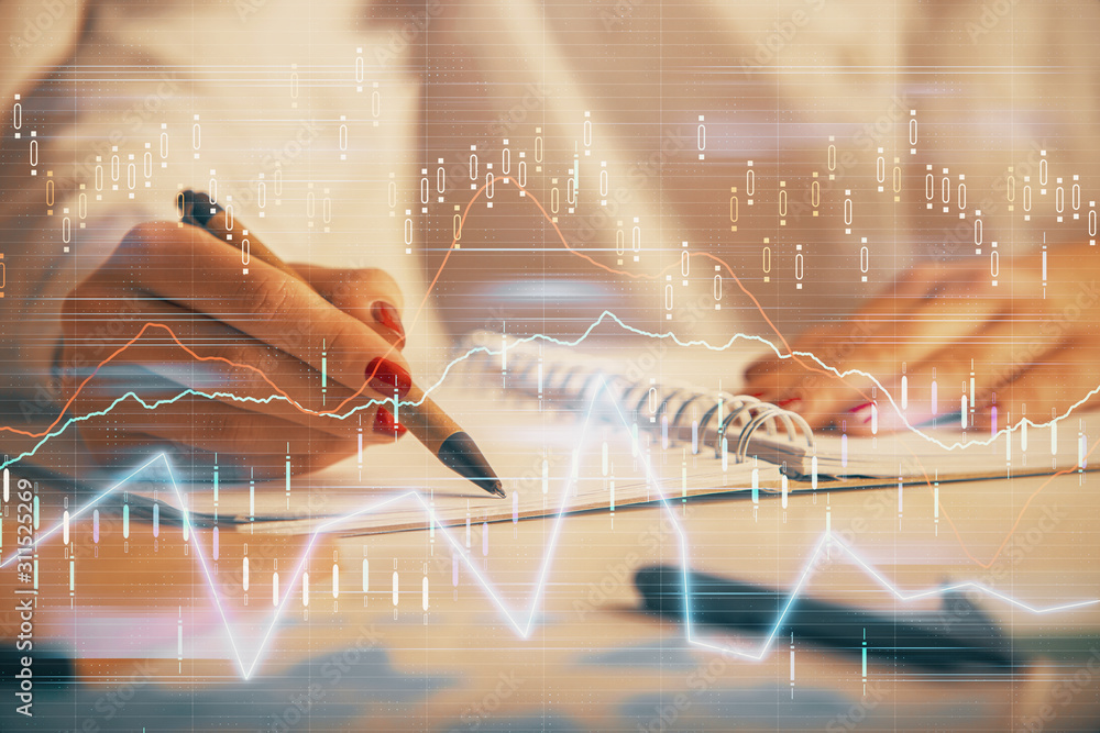 Double exposure of woman's hands making notes with forex graph hologram. Concept technical analysis. Double exposure of woman's hands making notes with forex graph hologram. Concept technical analysis.