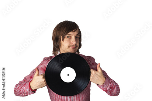 A man holds a black vinyl record. Isolate on a white background. Thumbs up.