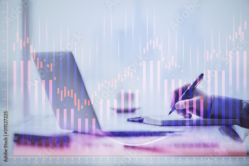 Multi exposure of forex chart with man working on computer on background. Concept of market analysis. © peshkova