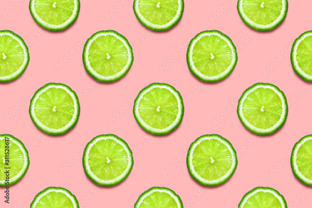 Lime slices seamless pattern on pastel pink background. Minimal summer concept. Flat lay, trendy juicy color.