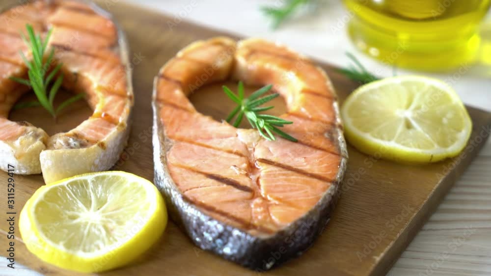 grilled salmon steak fillet with lemon grilled salmon steak fillet with lemon