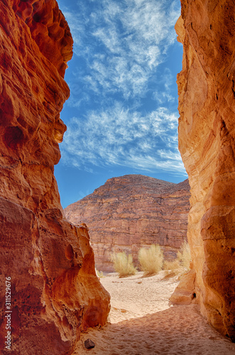 Color Canyon of Egypt in Nuweiba with beautiful sky.