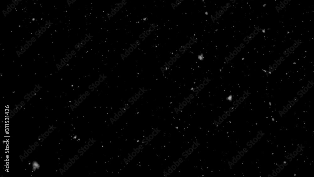Falling snow on a black background. Realistic large and small snowflakes on the wind Falling snow on a black background. Realistic large and small snowflakes on the wind