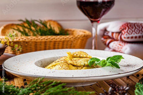 Italian food. Ravioli with feta cheese. Serving in a restaurant with Ukrainian style. Copy space, background image