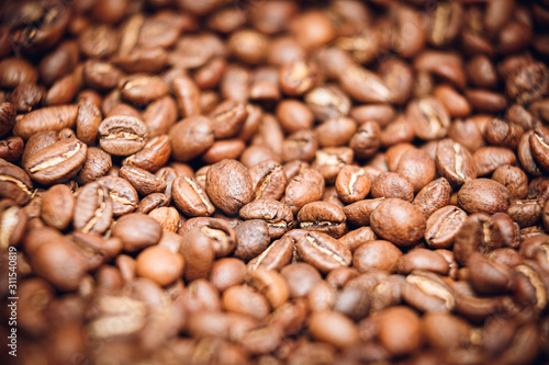 Beans of roasted coffee, macro photo.