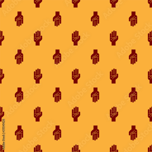 Red Palmistry of the hand icon isolated seamless pattern on brown background.  Vector Illustration