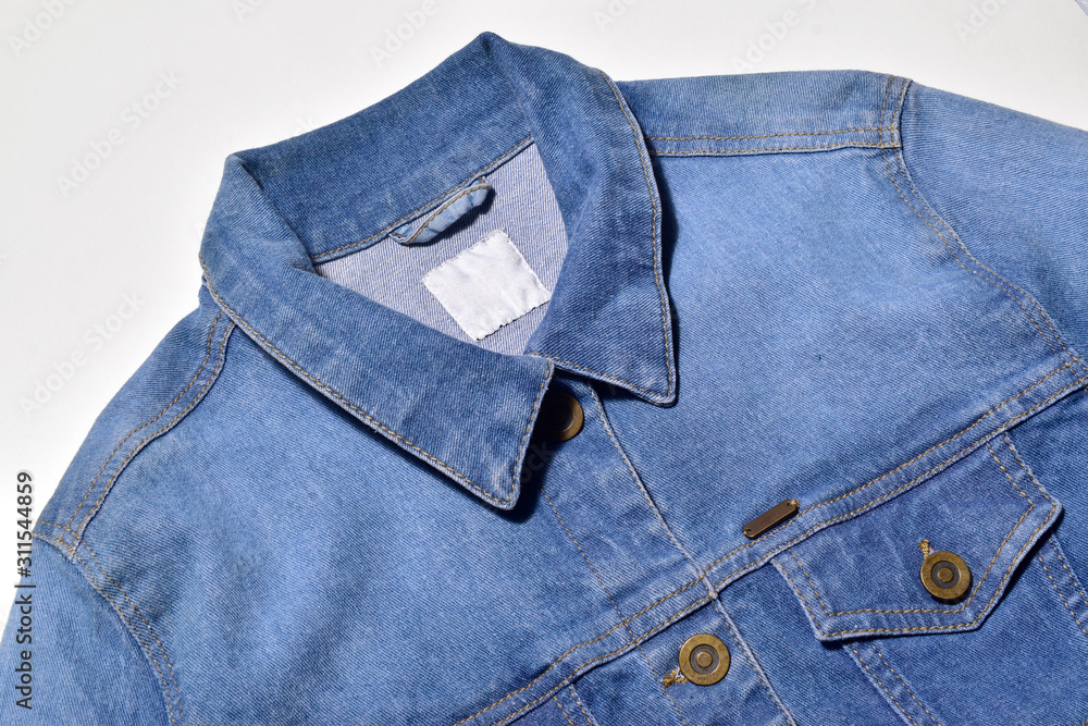 denim jacket over white background, close up denim jacket over white background, close up
