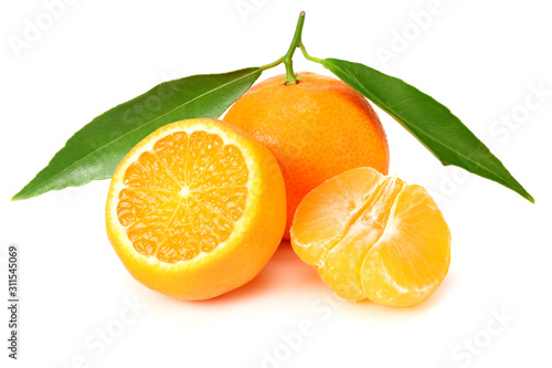 mandarin with slices and green leaves isolated on white background