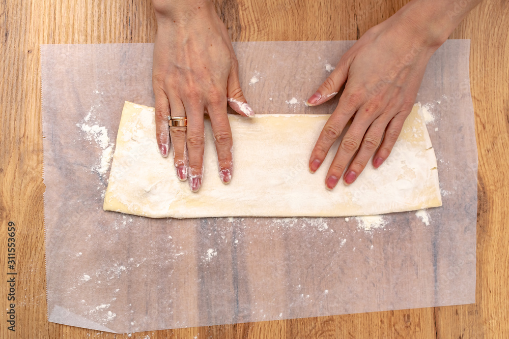 Baker making puff pastry baking Baker making puff pastry baking