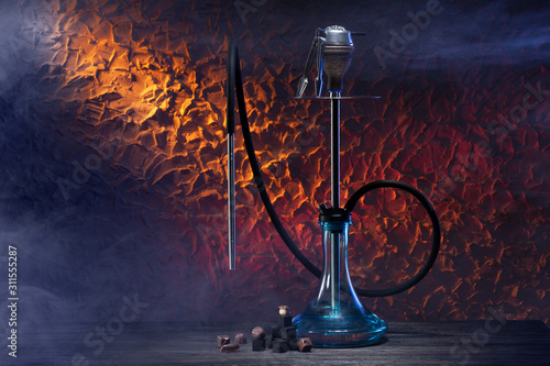 Modern oriental smoking hookah with the aroma chocolate for relax. Chocolate shisha