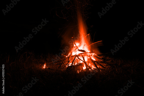 bonfire at night. fire at long exposure. flame. lush lava background 2020 color