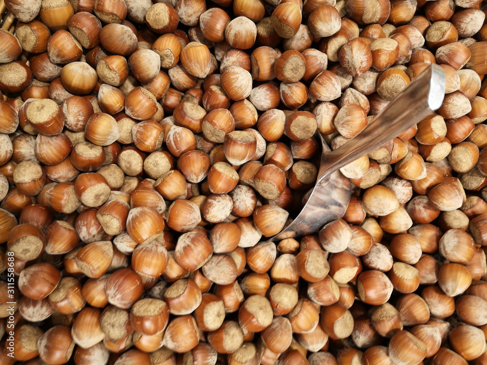 Hazelnuts for sale at rmarket. Background image on the subject of organic, vegan or vegetarian raw food. Hazelnuts for sale at rmarket. Background image on the subject of organic, vegan or vegetarian raw food.