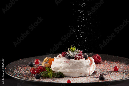 Pavlova is a meringue-based dessert named after the Russian ballerina Anna Pavlova photo
