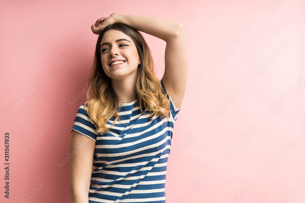 Young Beautiful Female Smiling In Studio Young Beautiful Female Smiling In Studio
