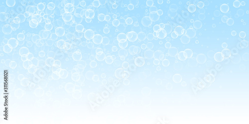 Random soap bubbles abstract background. Blowing b