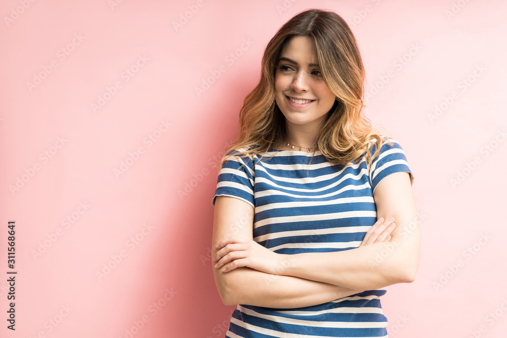 Smiling Confident Woman Looking Away In Studio Smiling Confident Woman Looking Away In Studio