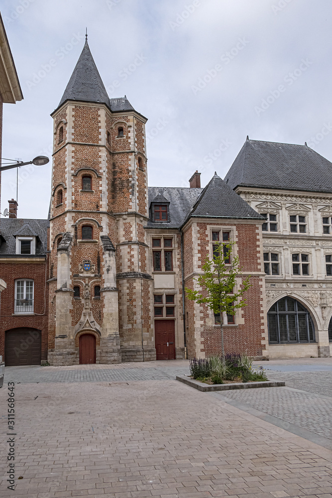 Logis du Roi, a former hotel known as Trois-Cailloux, is a brick and stone building with tower housing a spiral staircase, from beginning of XVI century. Amiens, Picardy, Somme, France.