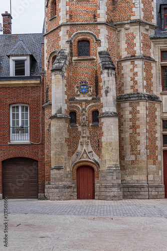 Logis du Roi, a former hotel known as Trois-Cailloux, is a brick and stone building with tower housing a spiral staircase, from beginning of XVI century. Amiens, Picardy, Somme, France.