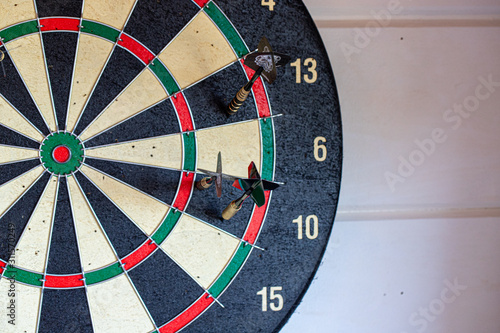 dartboard with darts