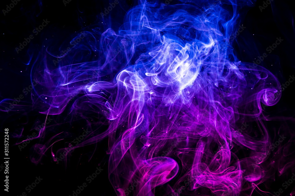 Colored smoke on black background Colored smoke on black background