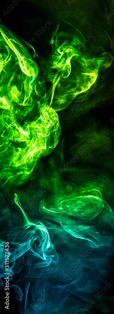 Obraz premium Colored smoke on black background