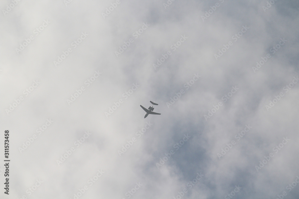 Aircraft in flight through the clouds Aircraft in flight through the clouds