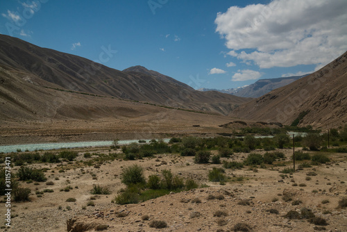 View on Wakhan Corridor in Afghanistan behind the Wakhan river. Taken from Pamir highway on Tajikistan side.