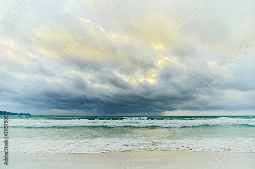 Sunset scenery of the sea along the White Beach of Boracay Island  Philippines. The sea is rougher with Habagat wind blowing during the rainy season.