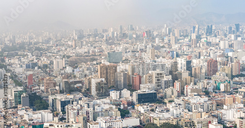 Ungraded aerial view of the build of Lima city, in Peru.