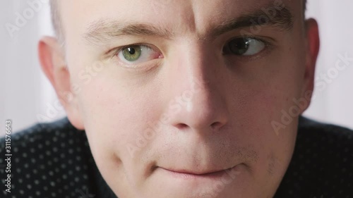 Running eyes of a liar or a worried person, close-up