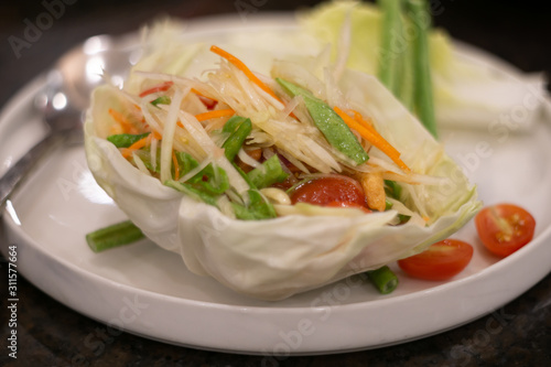 spicy papaya salad Thai food, cuisine traditional Thai food.