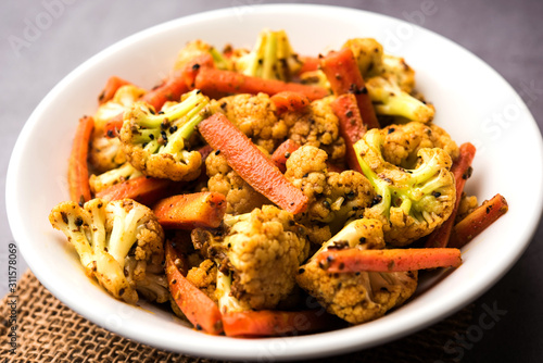 Carrots, cauliflowers achar made using PhoolGobi and Gajar. It's a sweet and sore seasonal pickle from India