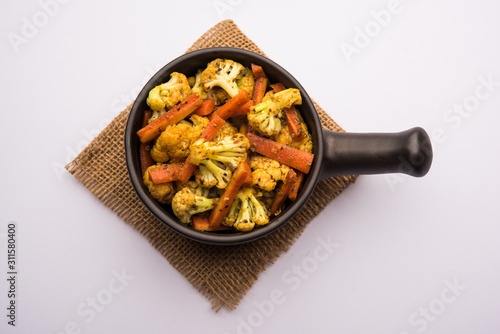 Carrots, cauliflowers achar made using PhoolGobi and Gajar. It's a sweet and sore seasonal pickle from India photo