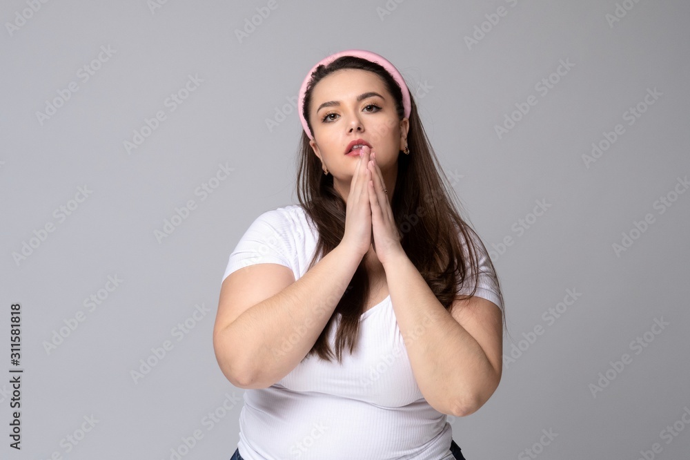 Plus size woman with hair rim in her hair. Plus size woman with hair rim in her hair.