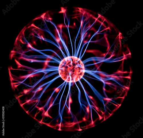 Decoration lamp in shape of plasma ball with red and blue electrodes photo