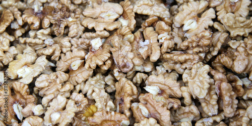 Peeled walnuts full frame photo. Walnuts pattern. Kernels.