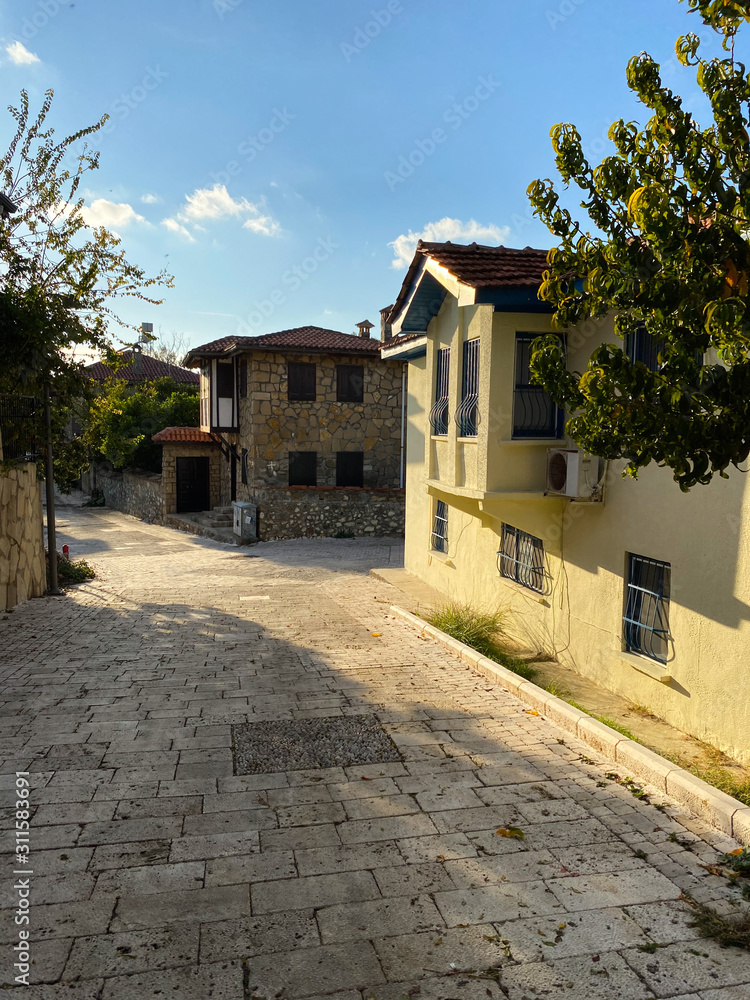 Small houses along the road. Turkey, Side. November 5, 2019.