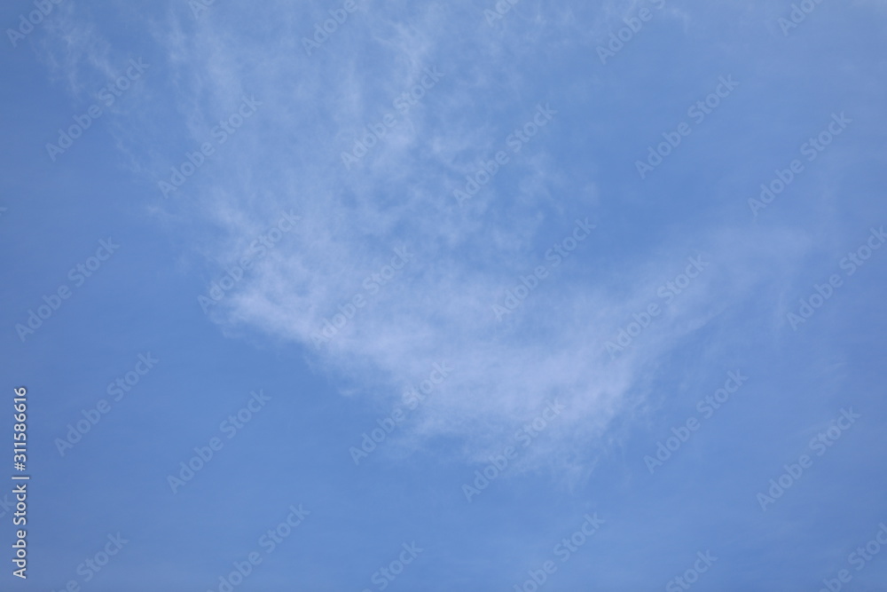 Fototapeta premium winter white clouds on blue sky background