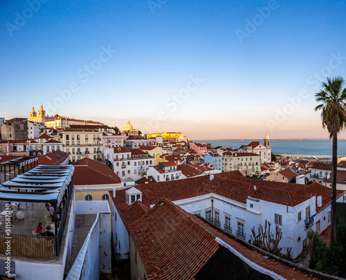 Panoramic picture over old city of Lisboa in Portugal during sunrise in summer