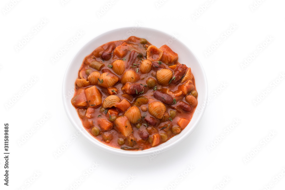 Pasta vegetable grains peas soup in tomato sauce on isolated white background Pasta vegetable grains peas soup in tomato sauce on isolated white background