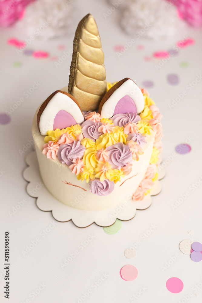 cake in the form of a unicorn. photo shoot cake smash cake in the form of a unicorn. photo shoot cake smash