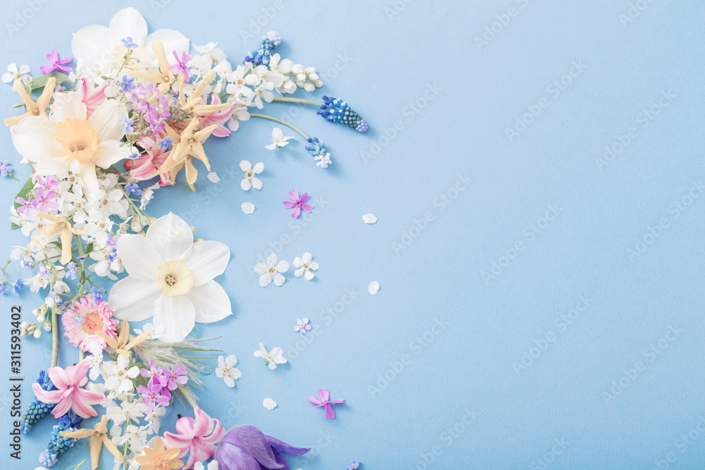 spring flowers on paper background - obrazy, fototapety, plakaty 