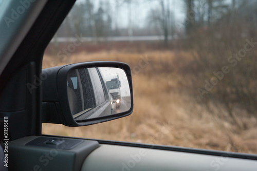 Truck in rear mirror
