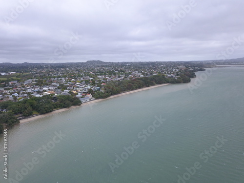 Waiheke Island, Auckland / New Zealand - December 24, 2019: The paradise island Waiheke with its stunning beaches, coastlines, hill terrains and vineyards photo