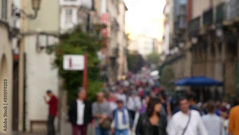 Anonymous Crowd of People Walking on City Street in a Blur. Slow Motion, spain Anonymous Crowd of People Walking on City Street in a Blur. Slow Motion, spain