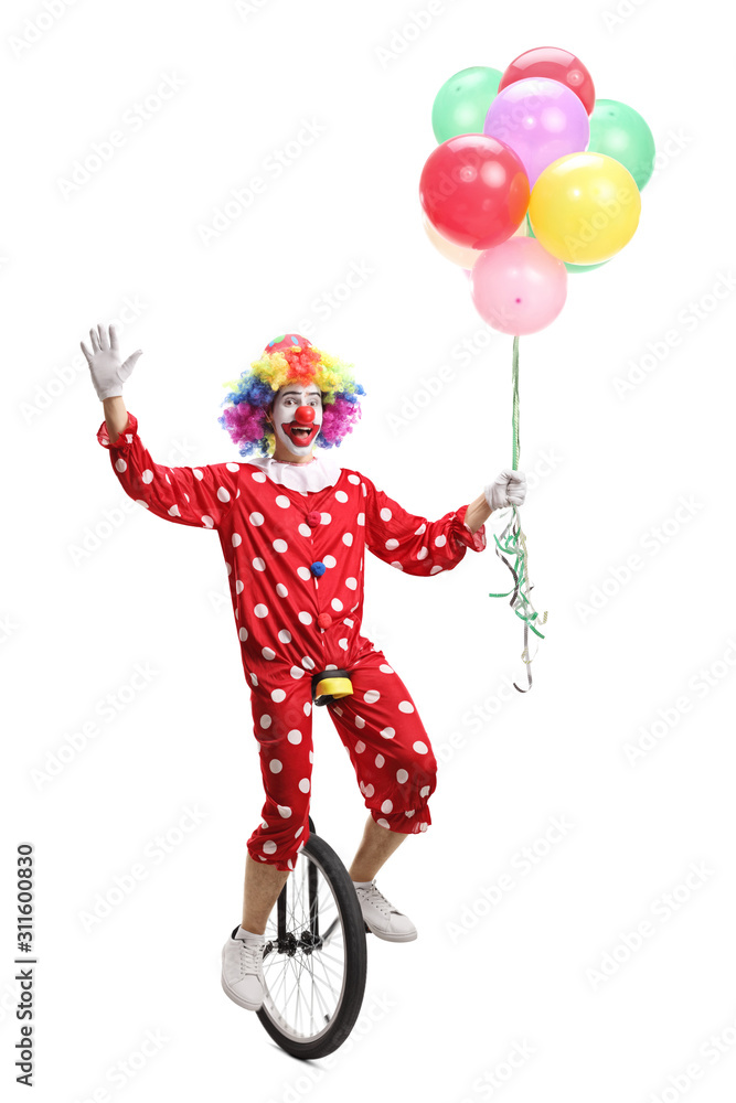 Happy clown riding a unicycle, holding a bunch of balloons and waving at the camera Happy clown riding a unicycle, holding a bunch of balloons and waving at the camera